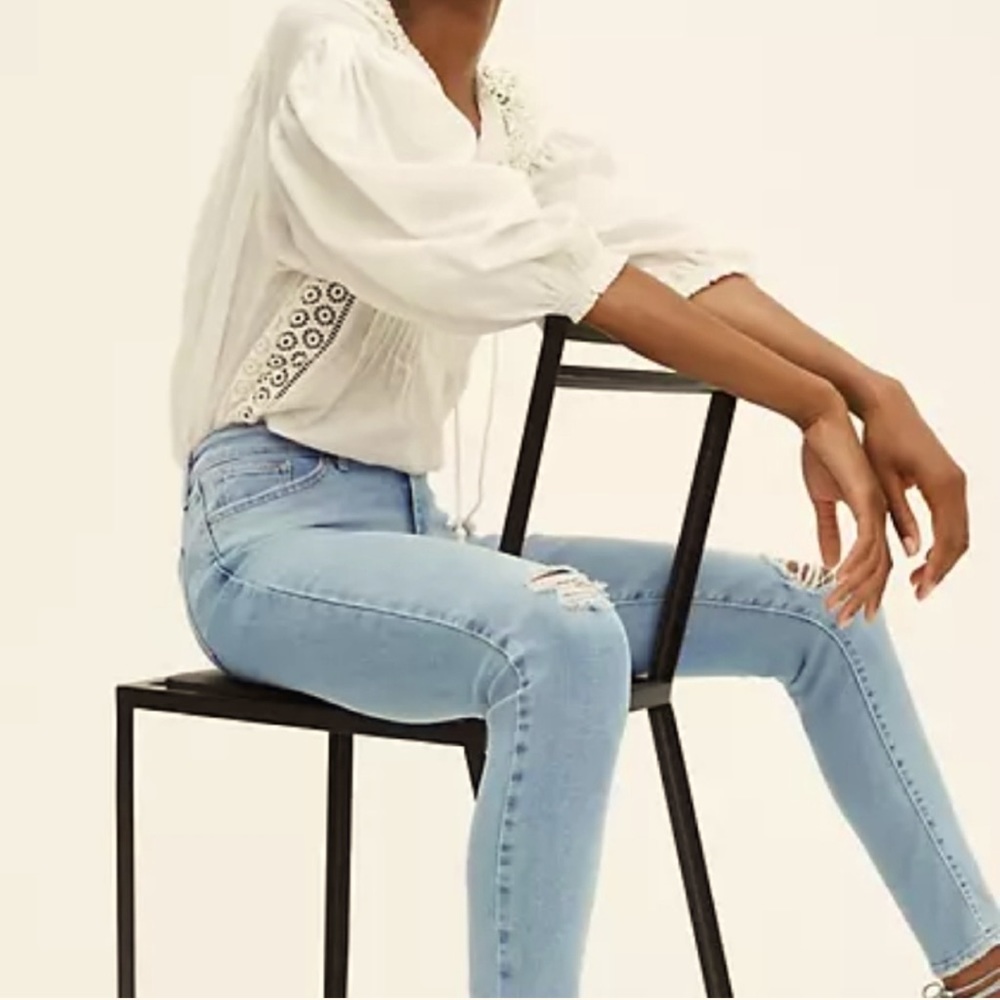 Levi’s 711 Distressed Light Wash Skinny Jeans